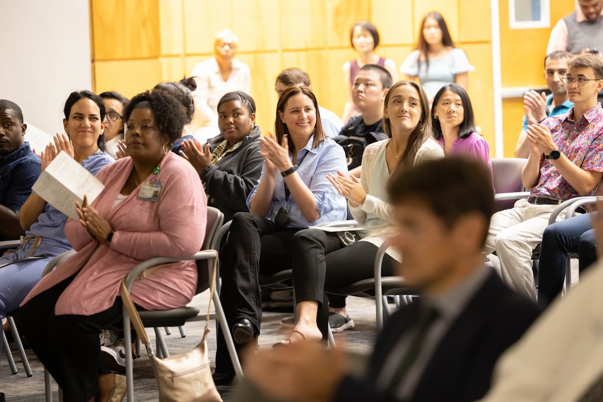 Audience clapping for students at the 2023 Honors and Awards Ceremony